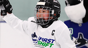Child playing hockey